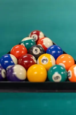 a pile of billiard balls on a table at Hillside Villa Ohio in Millersburg