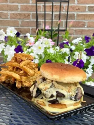 a plate of food with a sandwich and french fries at Kent State University Hotel and Conference Center in Kent