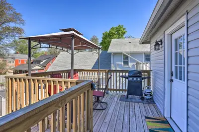 a deck with a grill and a gazebo at Port Clinton Getaway - Walk to Beach and Restaurants in Port Clinton