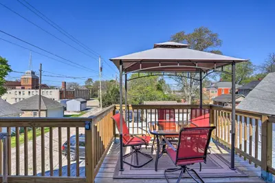 a gazebo with a table and chairs on a deck at Port Clinton Getaway - Walk to Beach and Restaurants in Port Clinton