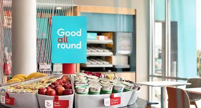 a display of food on a table in a store at avid hotels - Columbus Northwest - Hilliard by IHG in Hilliard