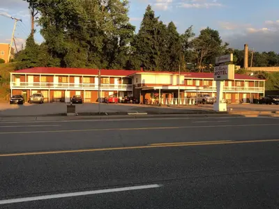 a building on the side of a road at St. Mary’s Motel in Saint Marys