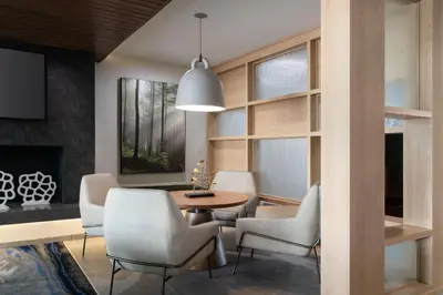 a dining room with a table and chairs at Fairfield Inn & Suites by Marriott Cleveland Tiedeman Road in Brooklyn