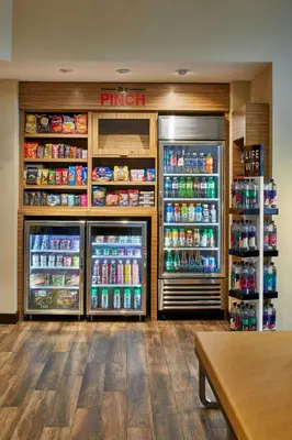 a grocery store with two refrigerators and drinks at TownePlace Suites by Marriott Columbus North - OSU in Columbus