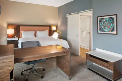 a hotel room with a bed and a desk at Hampton Inn Circleville, Oh in Circleville