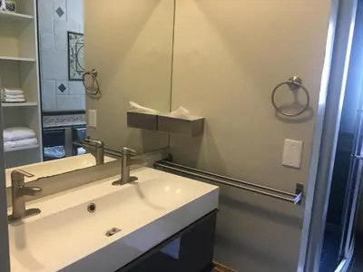 a bathroom with a sink and a mirror at Home Sweet Home in Solon