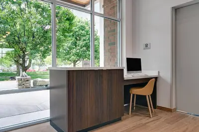 an office with a desk with a computer and a chair at TownePlace Suites by Marriott Columbus Dublin in Dublin
