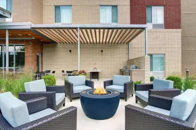 a patio with chairs and a fire pit at TownePlace Suites by Marriott Columbus Dublin in Dublin