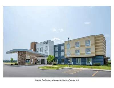 a rendering of a building with a parking lot at Fairfield Inn & Suites by Marriott Jeffersonville I-71 in Jeffersonville