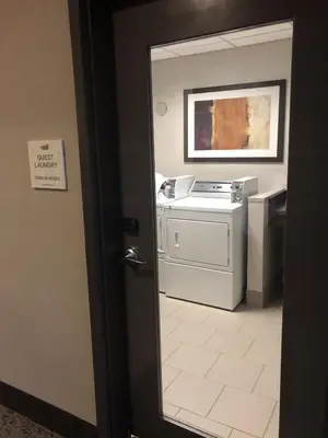 an open door to a kitchen with a stove at Homewood Suites by Hilton Columbus OSU, OH in Columbus