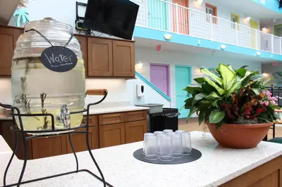 a kitchen with a jar of water on a counter at Worthington of Logan in Logan