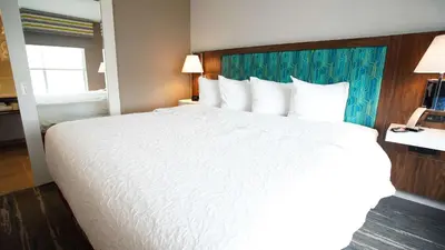 a large white bed in a hotel room at Hampton Inn & Suites St Clairsville, Oh in Saint Clairsville