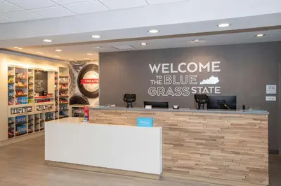 a welcome to the bluegrass state sign in a store lobby at Hampton Inn Richwood Cincinnati South, KY in Richwood