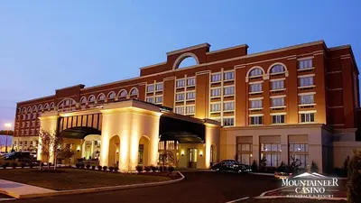 a large building with a building with at Mountaineer Casino Resort in New Cumberland