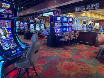 aroup of slot machines in a casino at Mountaineer Casino Resort in New Cumberland