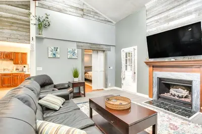 a living room with a couch and a fireplace at Grill, Yard and Fire Pit Huntsville Gem with Views in Huntsville