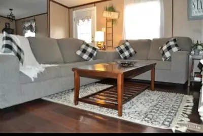 a living room with a couch and a coffee table at Convenient and Spacious home in Stanton, Ky in Stanton