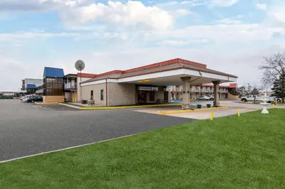 a gas station in a parking lot at Days Inn by Wyndham Perrysburg Toledo in Perrysburg