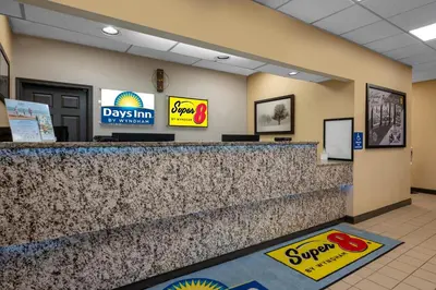 a view of a dry bill counter at a day inn at Super 8 by Wyndham Perrysburg-Toledo in Perrysburg