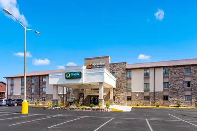 a hotel with a parking lot in front of it at Quality Inn Charleston South in Charleston