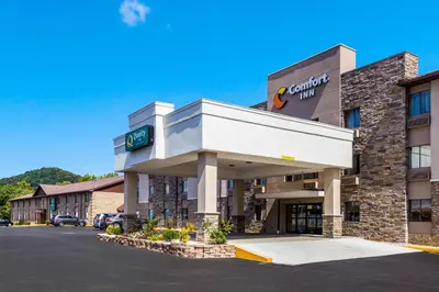 a rendering of a hotel with a parking lot at Quality Inn Charleston South in Charleston