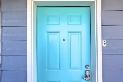 a blue front door of a house at Cozy Middle Bass Island Getaway On Lake Eerie! in Put-in-Bay