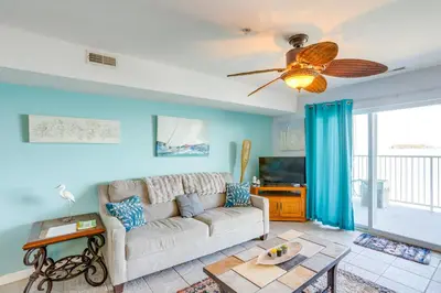 a living room with a couch and a ceiling fan at Cozy Middle Bass Island Getaway On Lake Eerie! in Put-in-Bay
