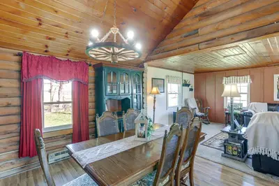 a dining room with a table and chairs in a room at Quiet Shiloh Retreat with Spacious Yard and Fireplace! in Shiloh