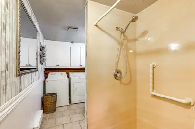 a small laundry room with a washer and dryer at Quiet Shiloh Retreat with Spacious Yard and Fireplace! in Shiloh
