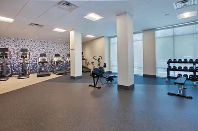 a gym with treadmills and exercise equipment in a building at Homewood Suites By Hilton Columbus Easton, Oh in Columbus