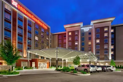 a rendering of a hotel with cars parked in a parking lot at Hilton Garden Inn Columbus Easton, Oh in Columbus