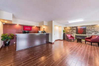 a lobby with a bar in a hotel room at Red Roof Inn Marion, IN in Marion