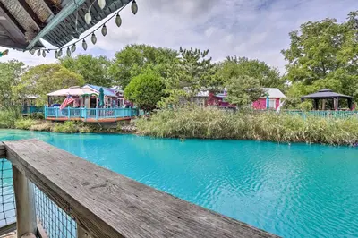 a view of a river from a wooden bridge at Resort-Style Condo with Lake-View Balcony! in Put-in-Bay