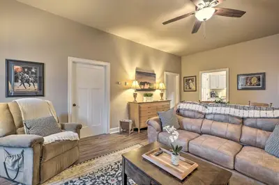 a living room with two couches and a ceiling fan at Quaint Apartment in Historic Georgetown! in Georgetown