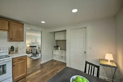 a kitchen and living room with a table and a kitchen at Cozy Home on 17 Acres, 3 Miles to Downtown! in Fort Wayne