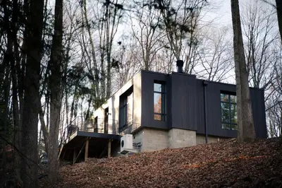 a house on top of a hill in the woods at Idyll Reserve - Hocking Hills in South Bloomingville