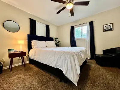a bedroom with a bed and a ceiling fan at Nice Place for the Budget Conscious in Middletown