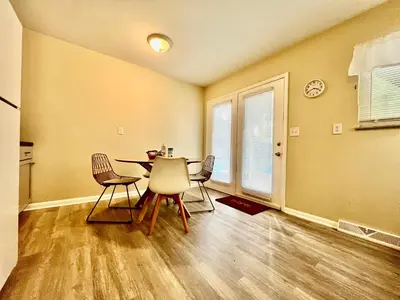 a dining room with a table and three chairs at Nice Place for the Budget Conscious in Middletown