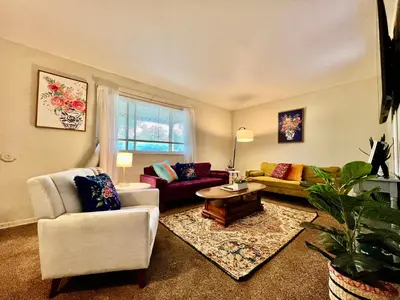 a living room with two couches and a table at Nice Place for the Budget Conscious in Middletown