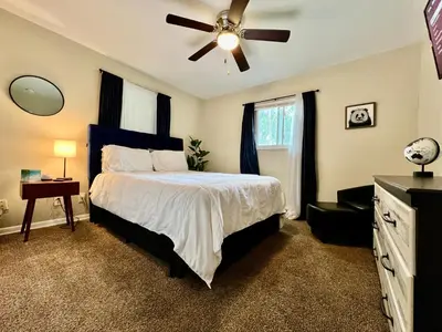 a bedroom with a bed and a ceiling fan at Nice Place for the Budget Conscious in Middletown