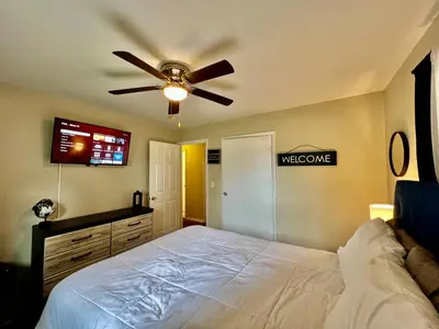 a bedroom with a bed and a ceiling fan at Nice Place for the Budget Conscious in Middletown