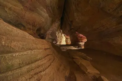 a view of a cave in a canyon at Creekwood Chalet - Hocking Hills with Hot Tub and Near Hiking in South Bloomingville