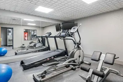 a gym with several exercise bikes in a room at Country Inn & Suites by Radisson, Pickerington, OH in Pickerington