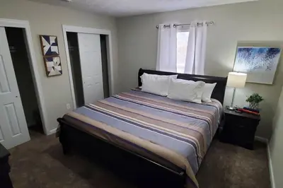 a bedroom with a large bed in a room at Diamond in the Rough-696 in Middletown