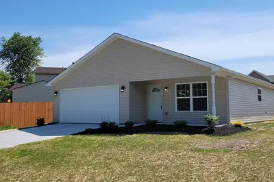 a house with a white garage at Diamond in the Rough-696 in Middletown