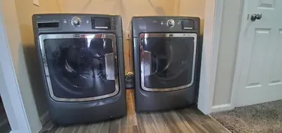 two washing machines are sitting next to each other at Diamonds are Forever-700 in Middletown
