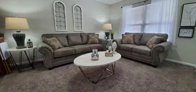 a living room with two couches and a table at Diamonds are Forever-700 in Middletown