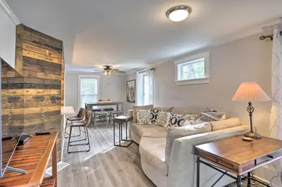 a living room with a couch and a table at Pet-Friendly Home - half Mi to Downtown Willoughby! in Willoughby