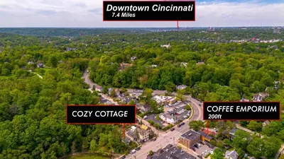 an overhead view of a town with trees at Cozy Cottage in the Heart of Hyde Park home in Cincinnati