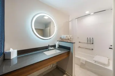 a bathroom with a sink and a mirror at Fairfield by Marriott Inn & Suites Columbus Canal Winchester in Canal Winchester